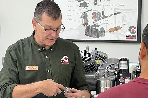 Mark Humphries explaining air filters for Cattani dental compressors